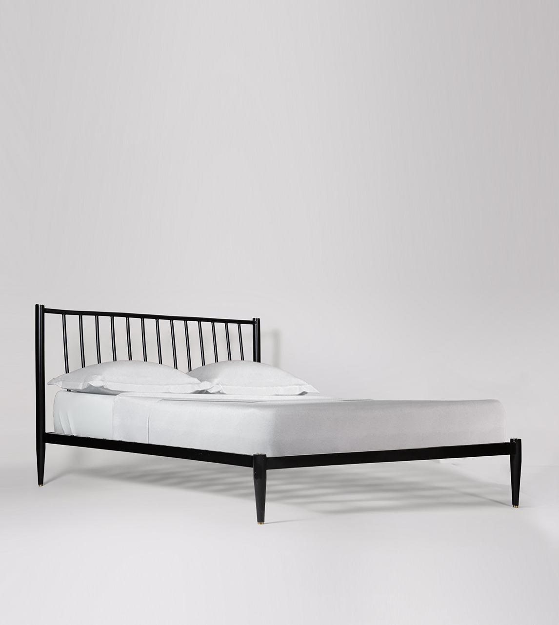 Black and store brass bed frame