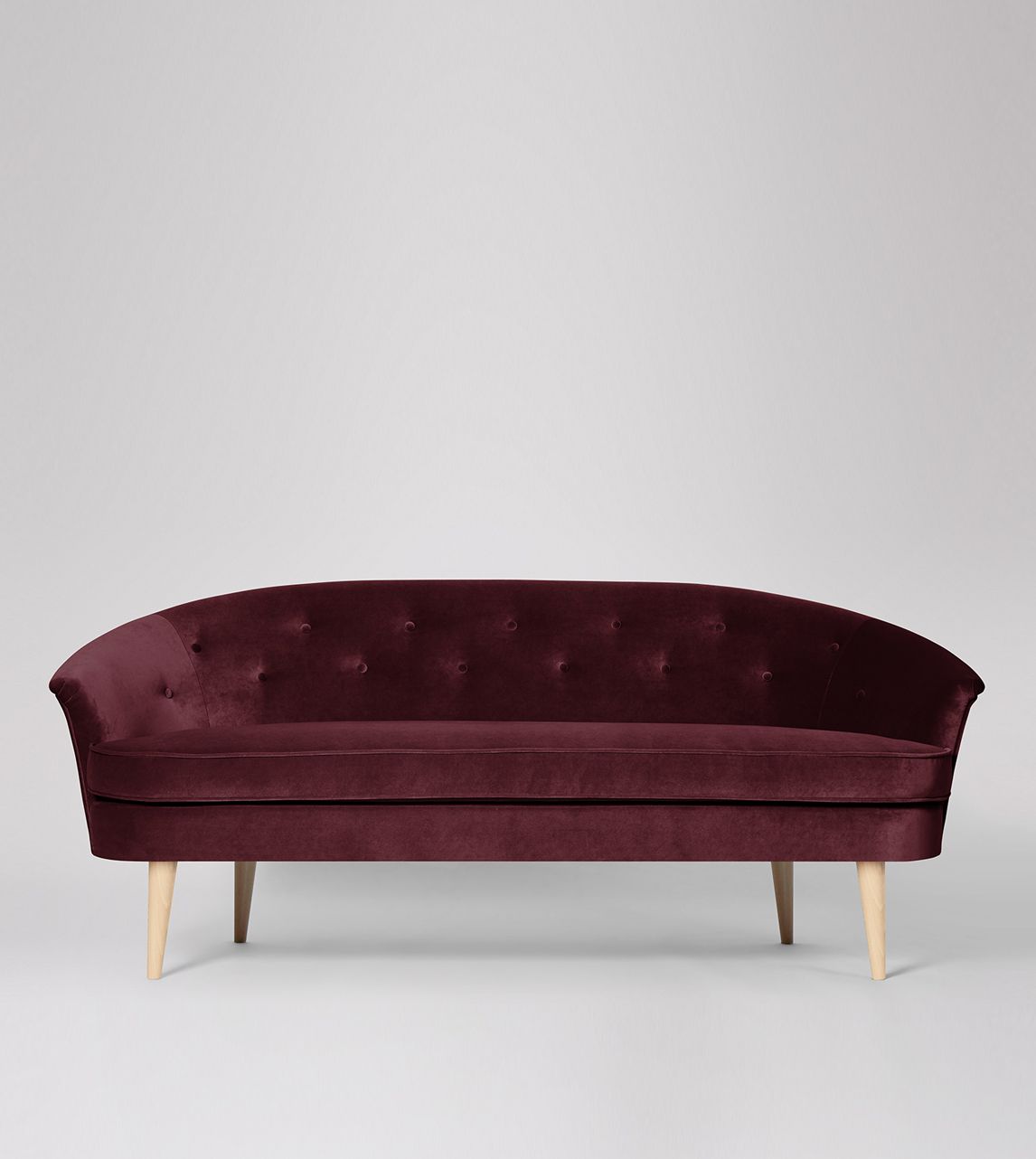 Calla Two-Seater Sofa in Bordeaux Easy Velvet with Oak Feet | Swoon