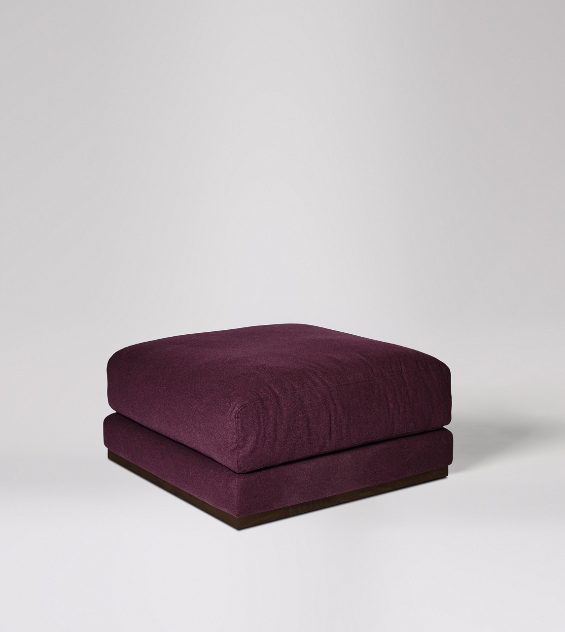 Denver Footstool in Elderberry Soft Wool with Dark Oak Feet Swoon