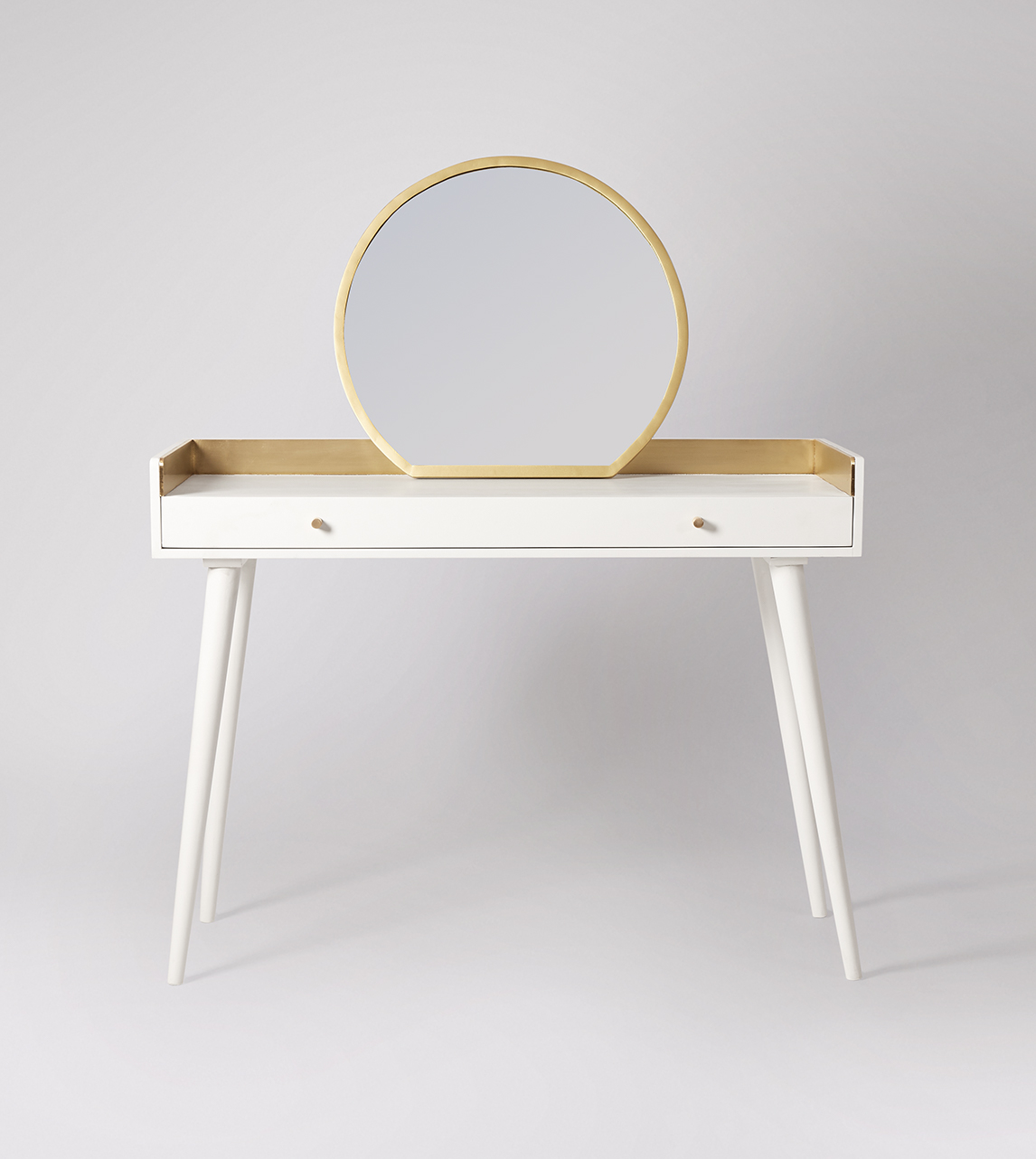 brass and white desk