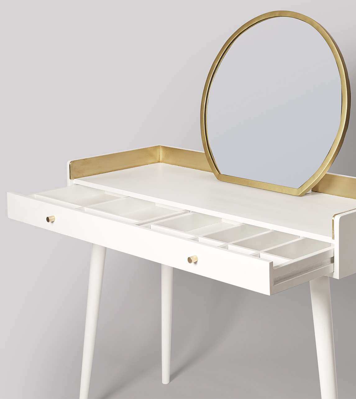 white and brass dressing table